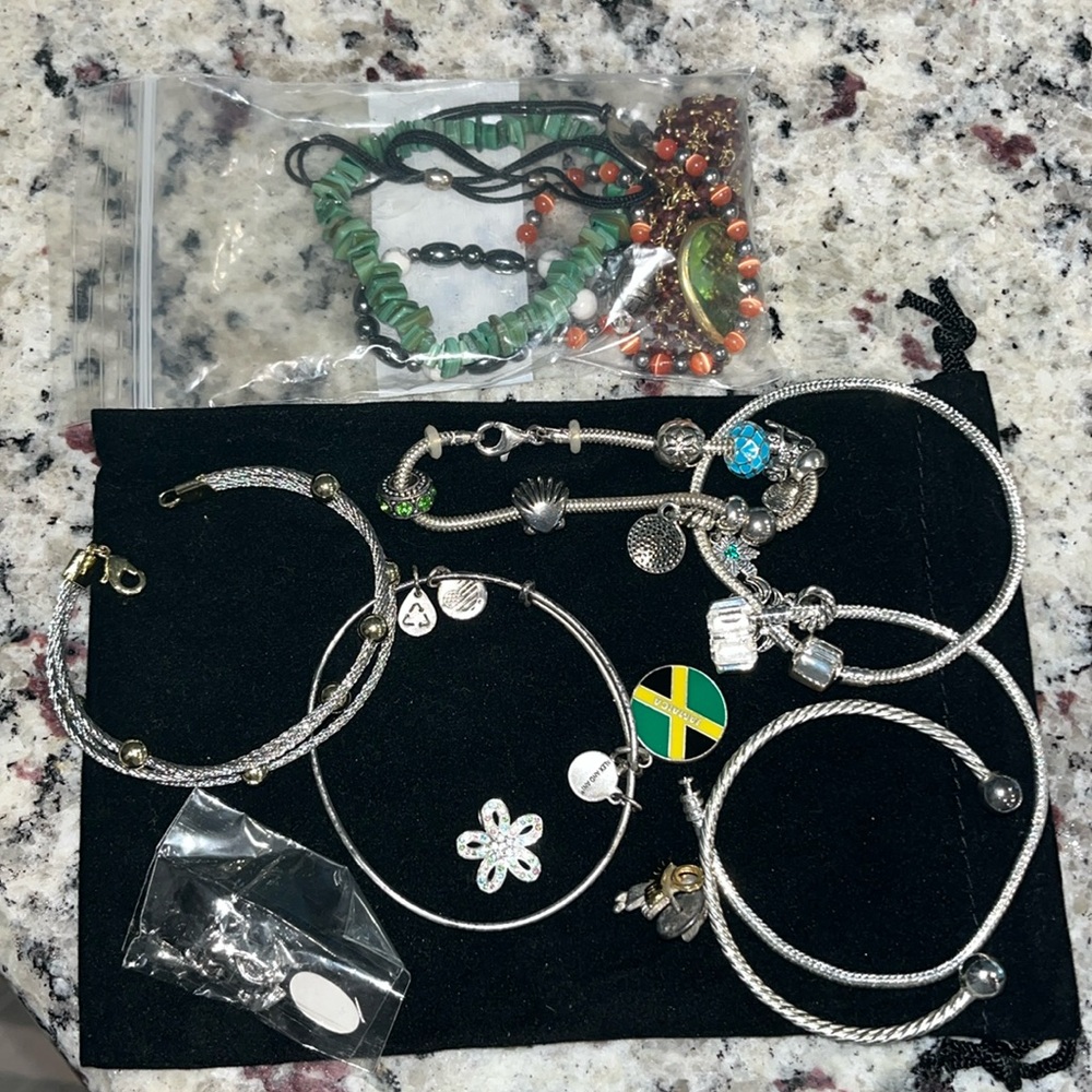 Random odds and ends of jewelry. One set of all